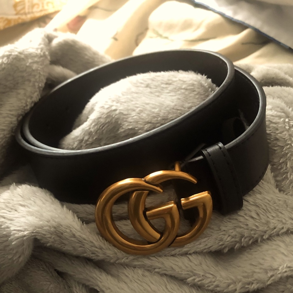 Gucci belt fits sizes 30-32